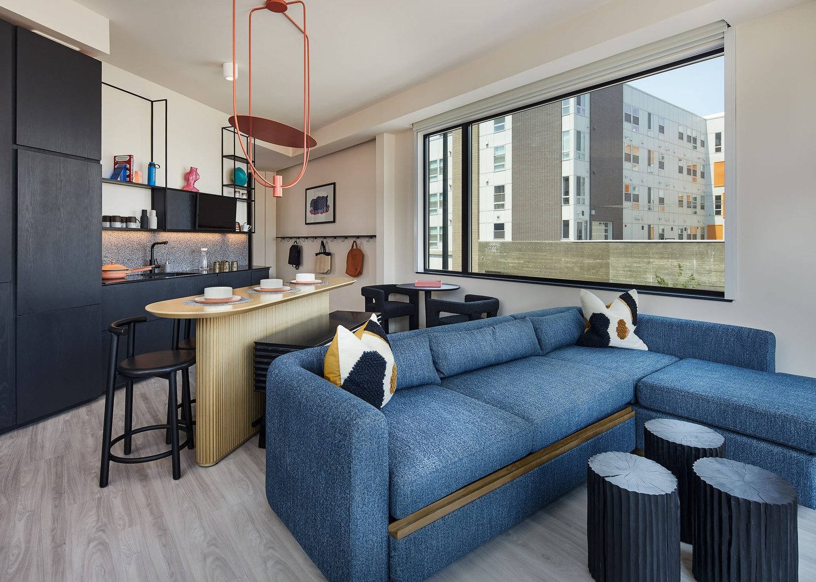 Modern living space with full kitchen